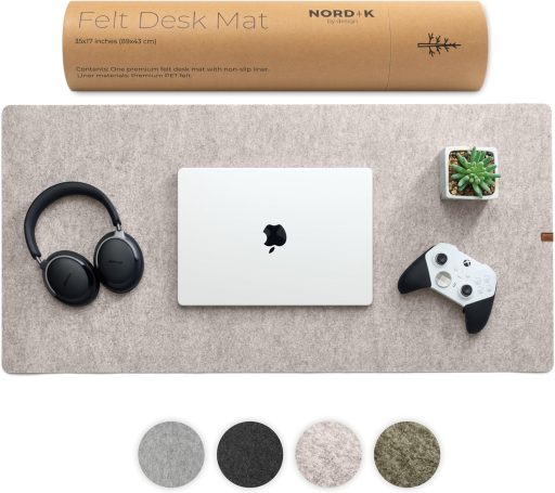 Beige linen desk mat on wooden desk in Scandinavian home office setup