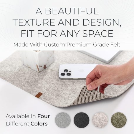 Beige linen desk mat on wooden desk in Scandinavian home office setup