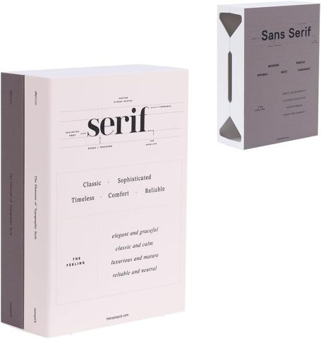 Scandinavian-style cable management box disguised as stacked books, keeping desk cords organized in a minimalist home office